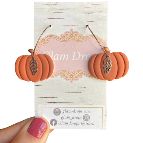 Clay pumpkins on hoops