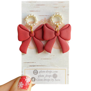 Bow with circle pearl studs