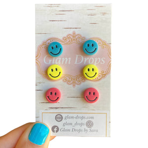 Clay smiley face studs set