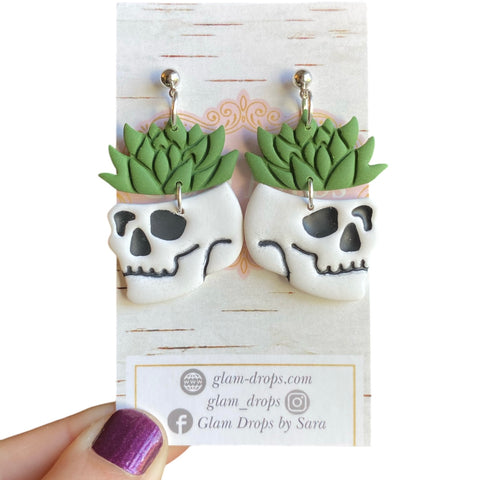 Clay skull planter dangles