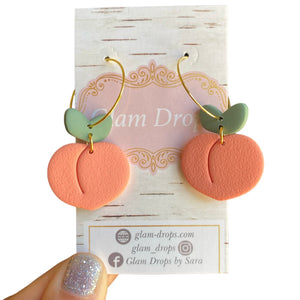 Clay peaches on hoops